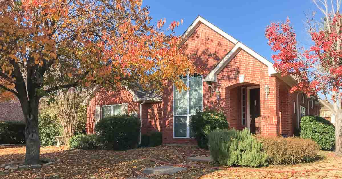 single-family house near sidewalk in suburban Dallas, Texas, USA.