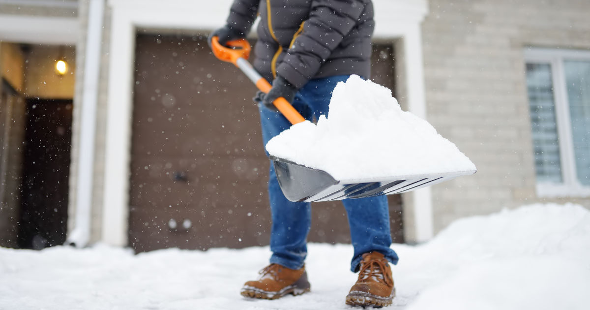 person shoveling snow